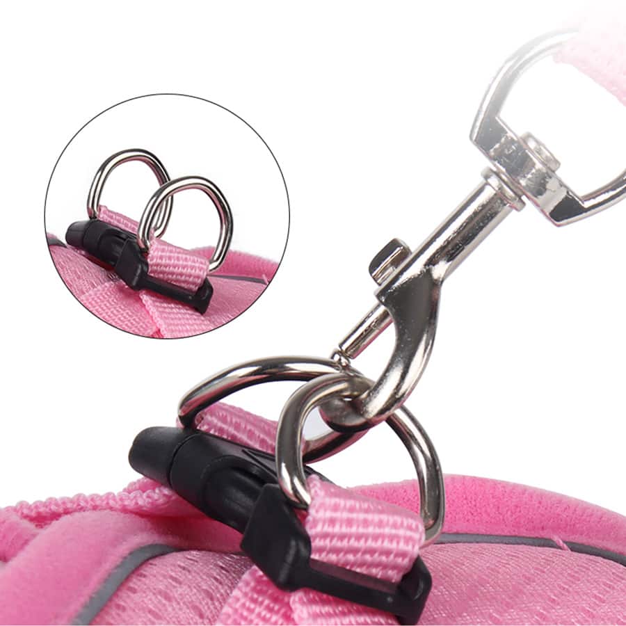 Adjustable vest-style pet harness and leash set for small and medium dogs and cats, made with breathable mesh and reflective stripes for no-pull walking.