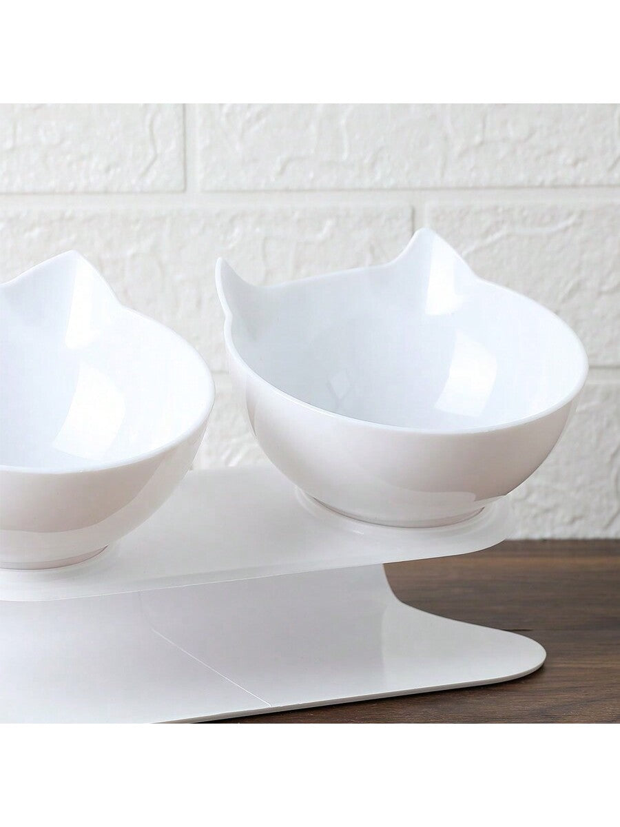 Black cartoon cat design pet bowl set with two PS plastic bowls fitted into a matching base for cats and dogs.