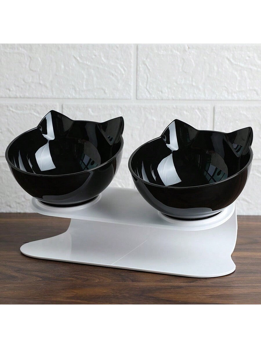 Black cartoon cat design pet bowl set with two PS plastic bowls fitted into a matching base for cats and dogs.