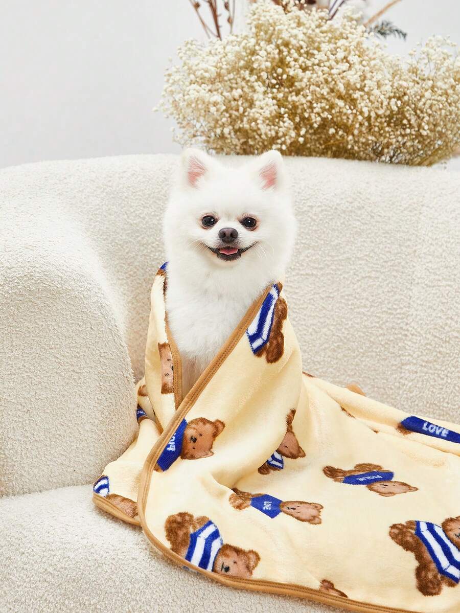 Warm pet blanket with a cute cartoon bear print in multicolor, made of 100% polyester fabric for cats and dogs.
