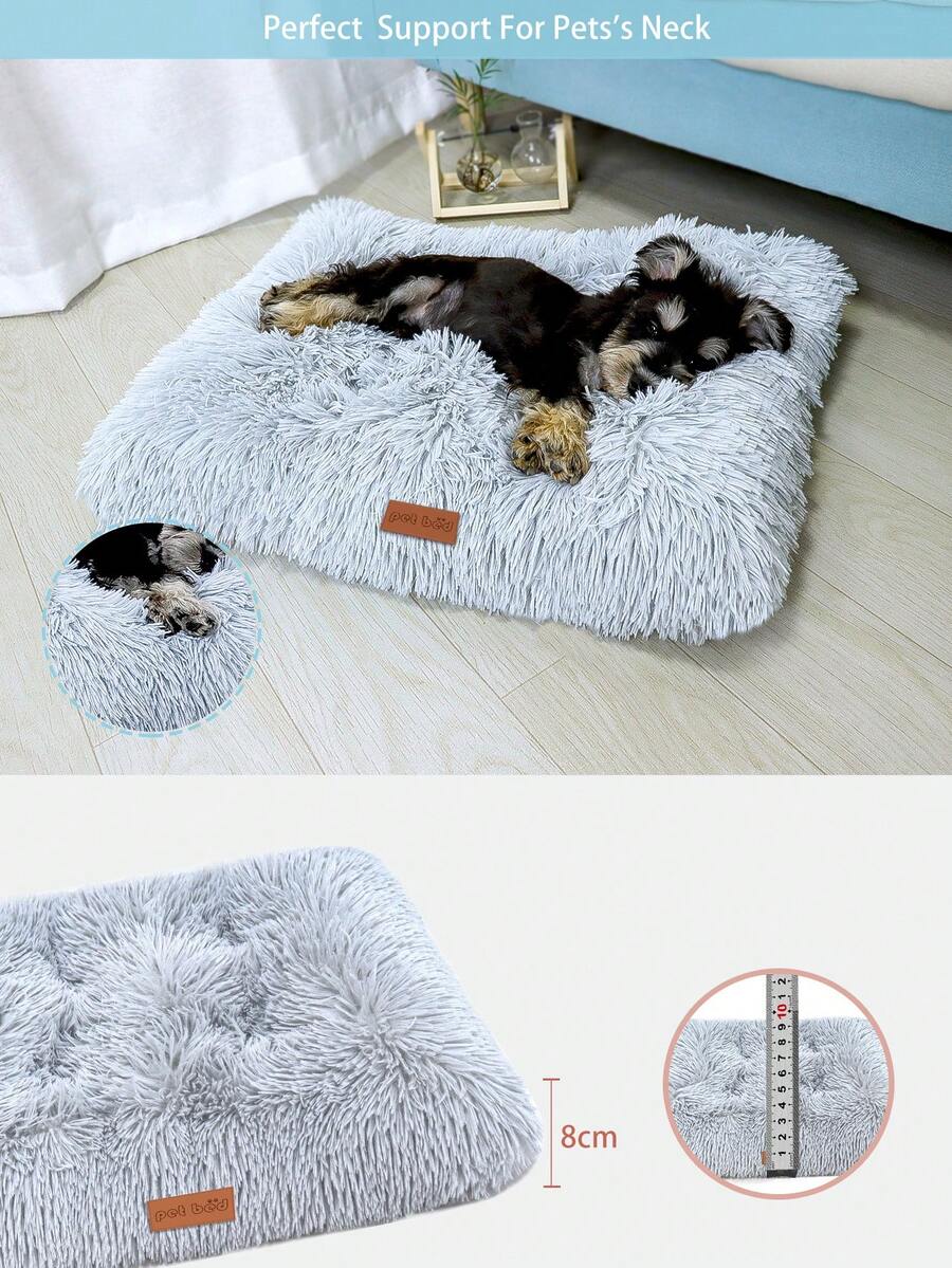 Washable dusty pink plush pet cage bed mat with cartoon pattern for dogs and cats featuring an anti-slip bottom.