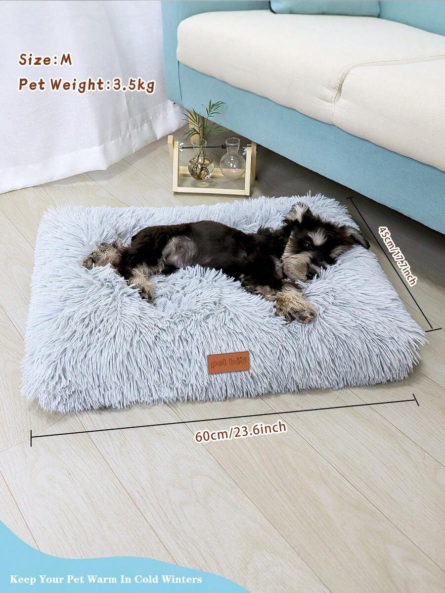 Washable dusty pink plush pet cage bed mat with cartoon pattern for dogs and cats featuring an anti-slip bottom.