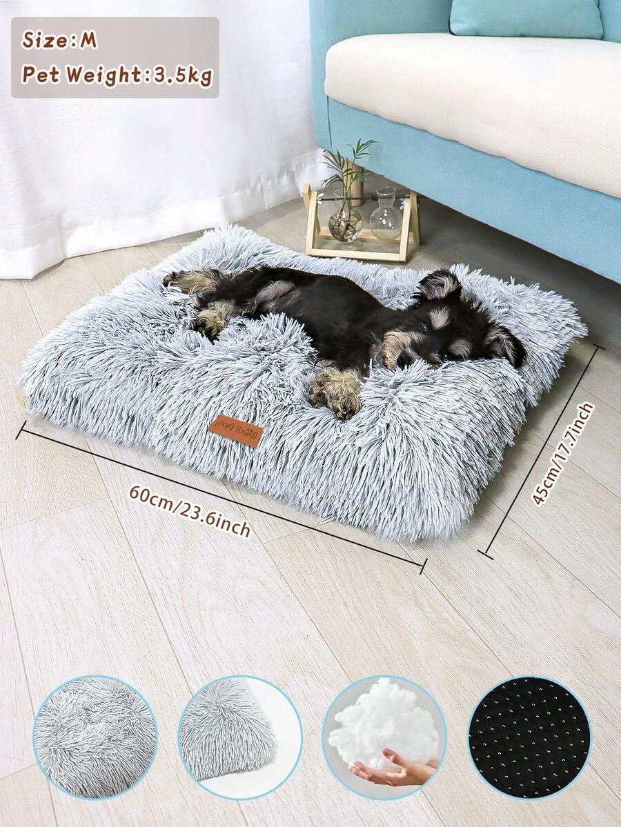Washable dusty pink plush pet cage bed mat with cartoon pattern for dogs and cats featuring an anti-slip bottom.