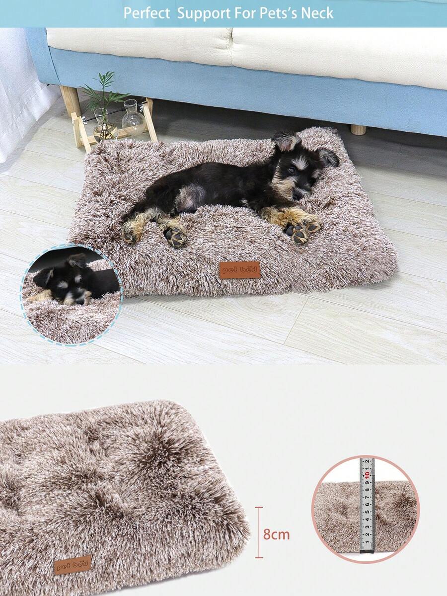 Washable dusty pink plush pet cage bed mat with cartoon pattern for dogs and cats featuring an anti-slip bottom.