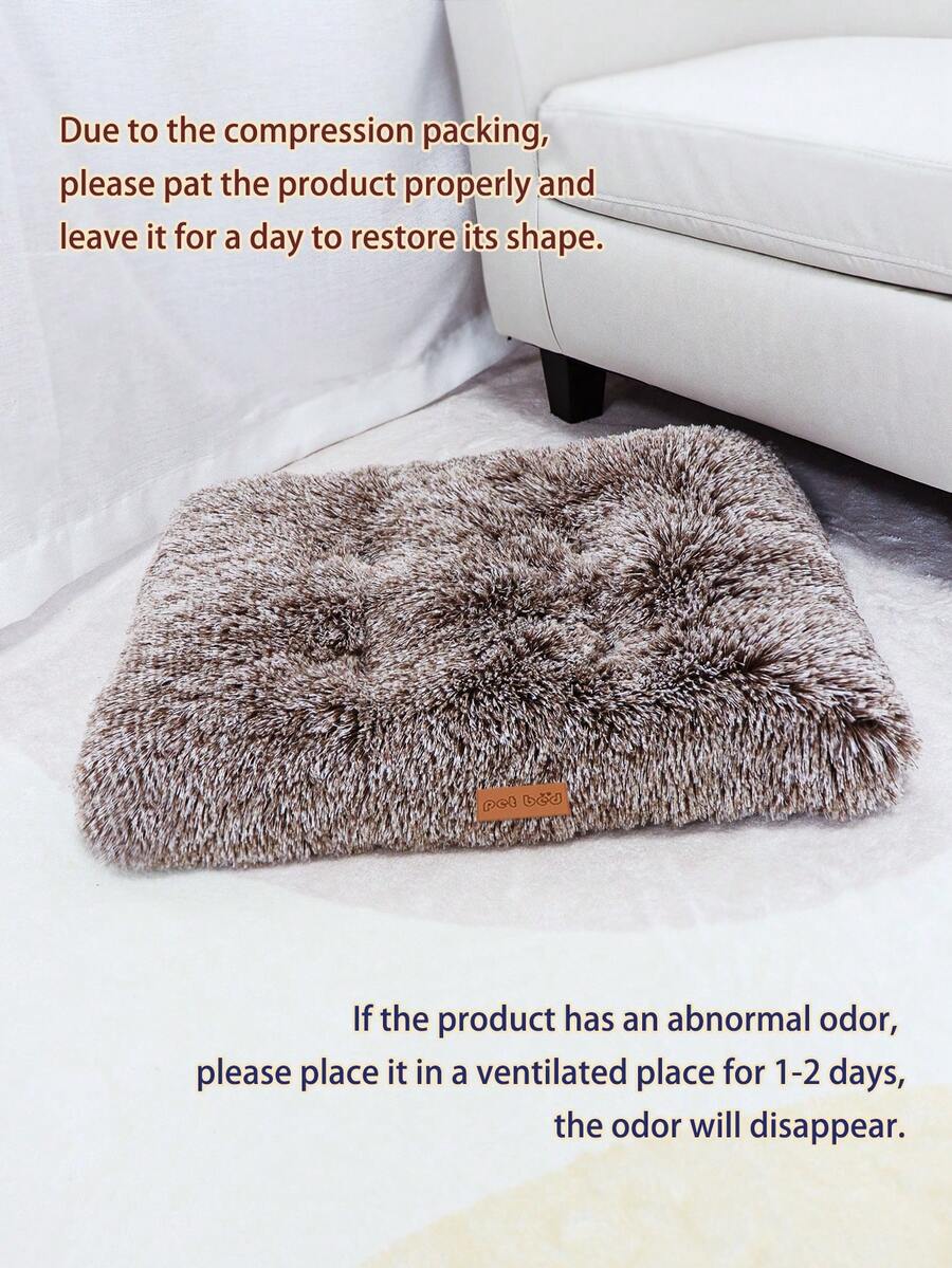 Washable dusty pink plush pet cage bed mat with cartoon pattern for dogs and cats featuring an anti-slip bottom.