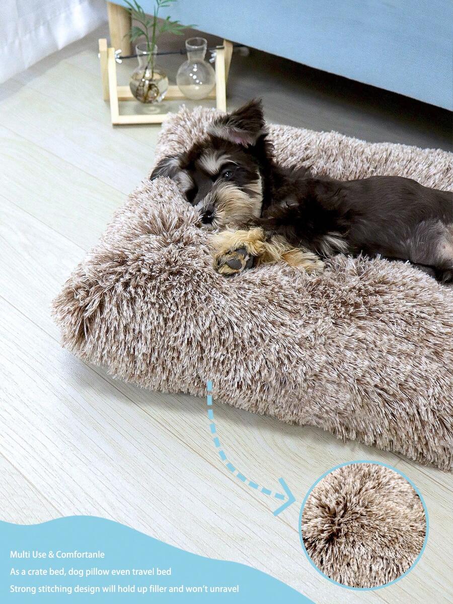 Washable dusty pink plush pet cage bed mat with cartoon pattern for dogs and cats featuring an anti-slip bottom.