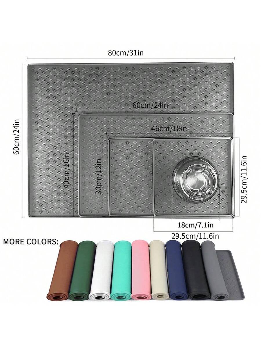 Beige silicone pet placemat with embossed paw print accents designed to catch food and water spills for dogs and cats.