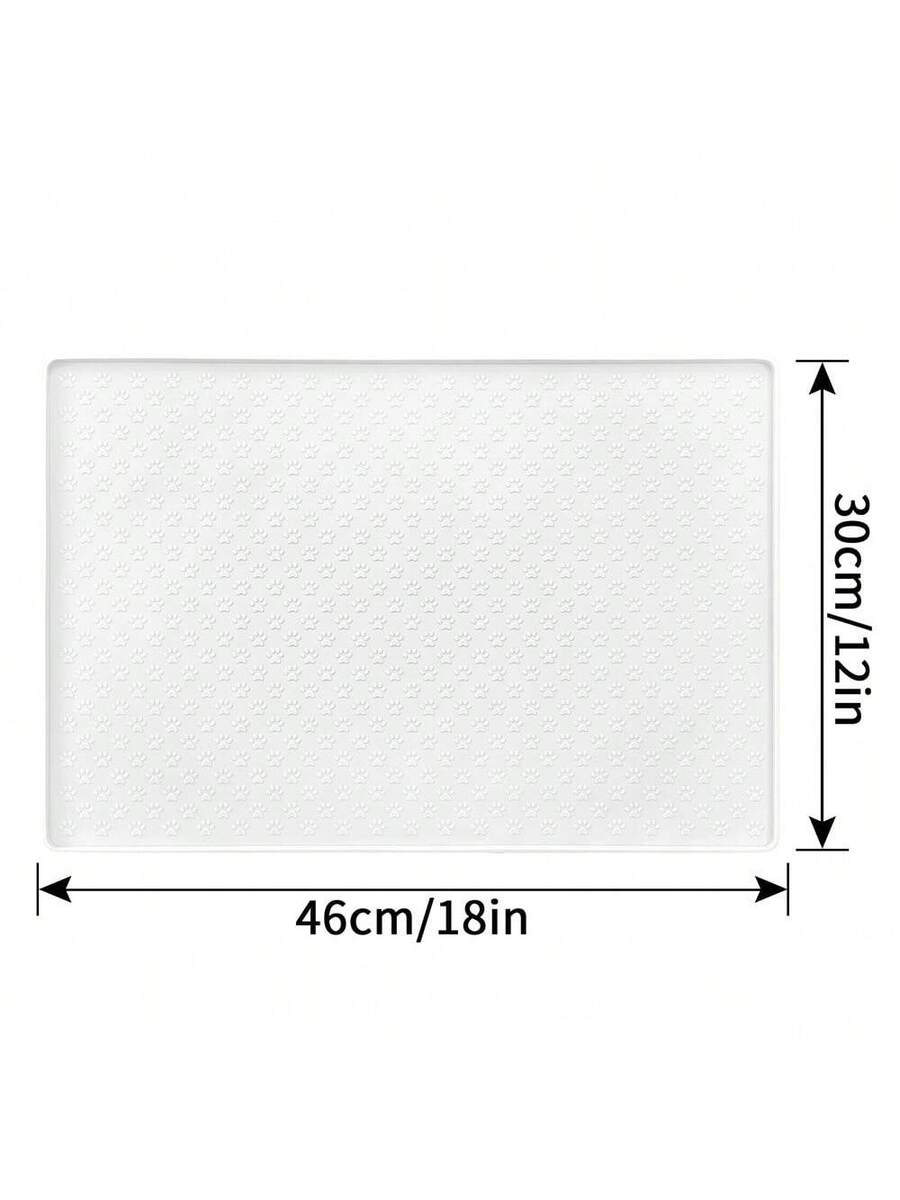 Beige silicone pet placemat with embossed paw print accents designed to catch food and water spills for dogs and cats.
