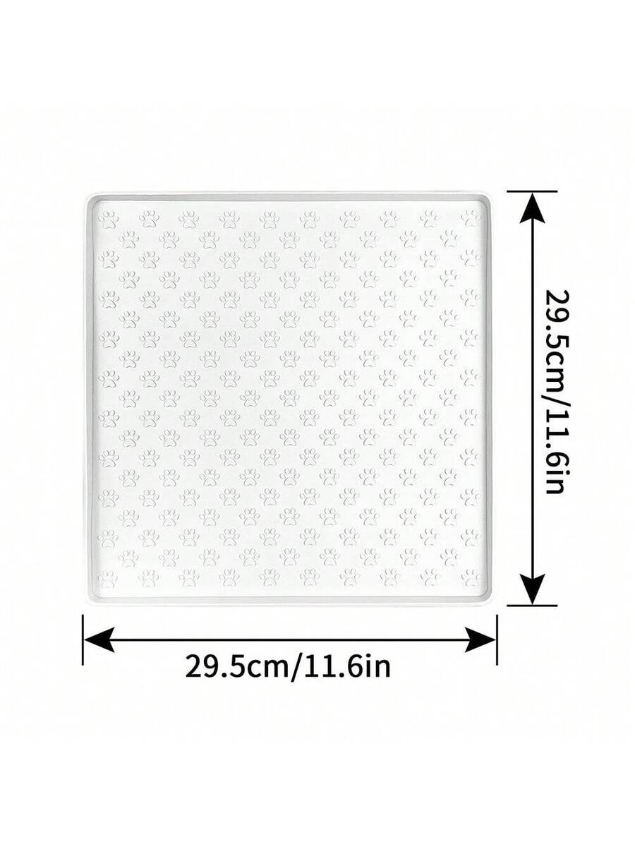 Beige silicone pet placemat with embossed paw print accents designed to catch food and water spills for dogs and cats.