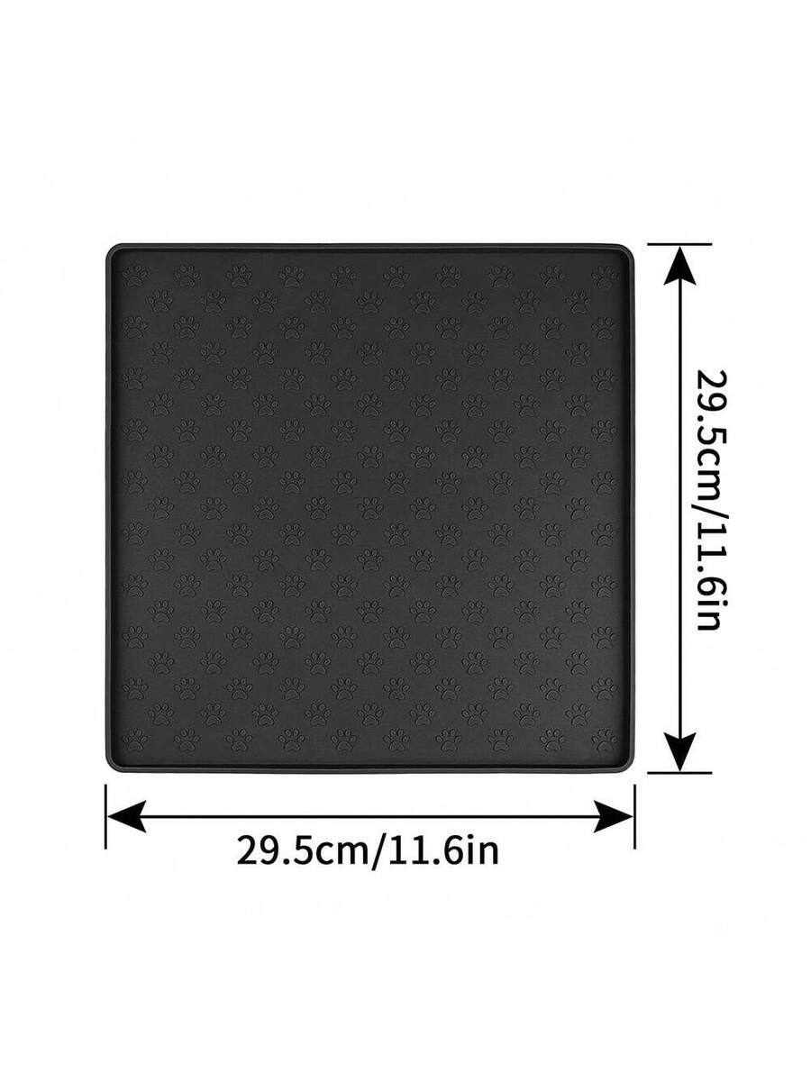 Beige silicone pet placemat with embossed paw print accents designed to catch food and water spills for dogs and cats.