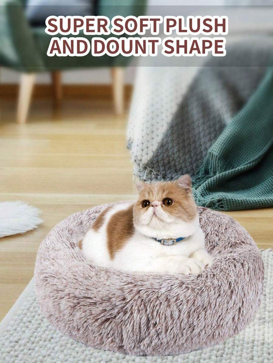 Champagne plush round pet bed for small and medium cats and dogs made from soft polyester material.