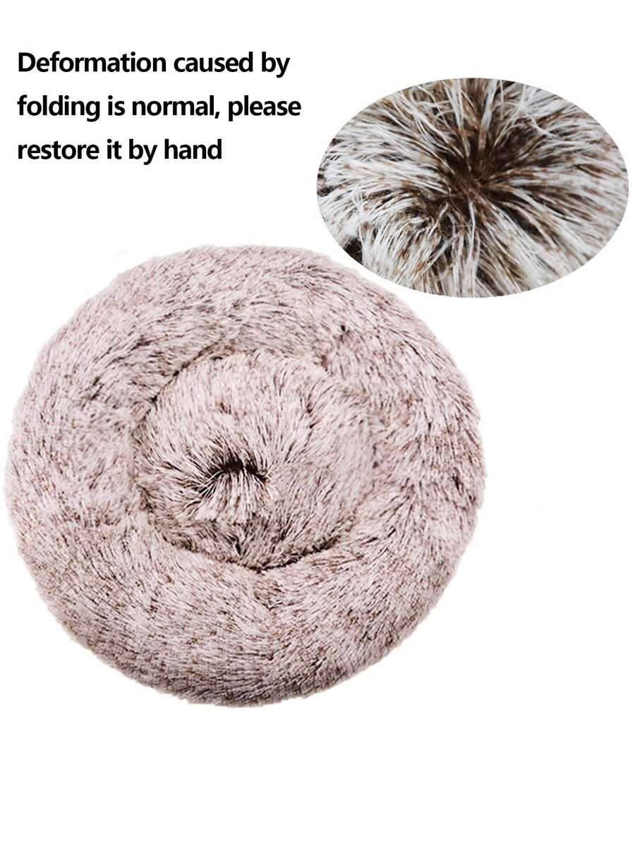 Champagne plush round pet bed for small and medium cats and dogs made from soft polyester material.