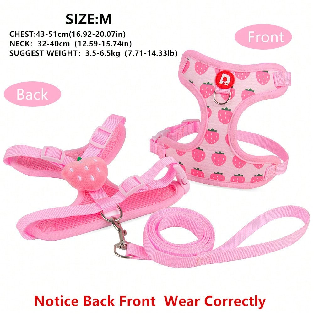 Pink adjustable polyester pet harness and leash set with cartoon pattern for cats and small dogs, designed for outdoor walking.