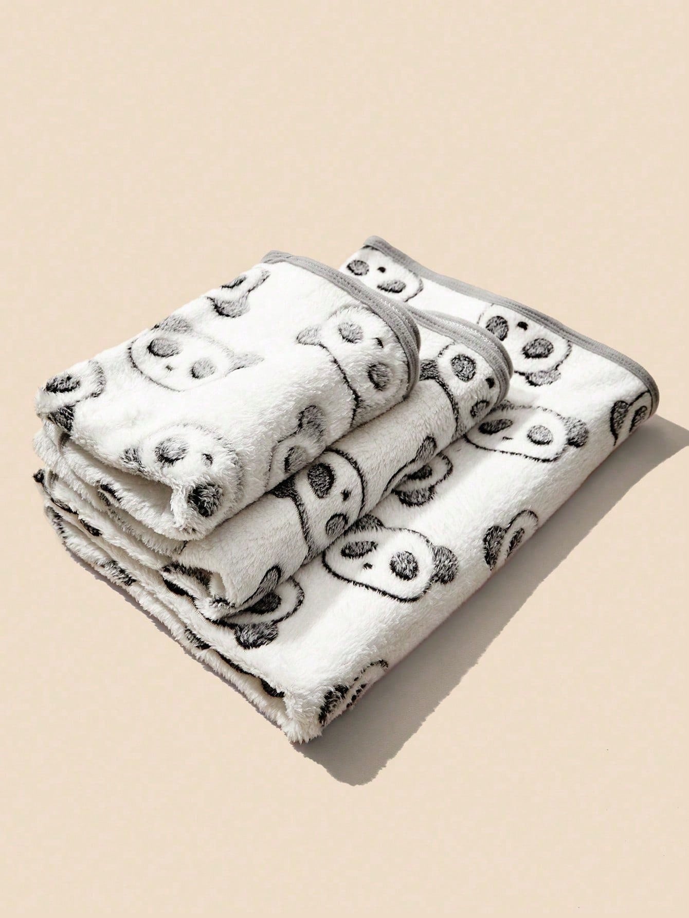 Warm plush pet blanket featuring a multicolor cartoon cat and plant print pattern, made from 100% polyester fabric for cats and dogs.