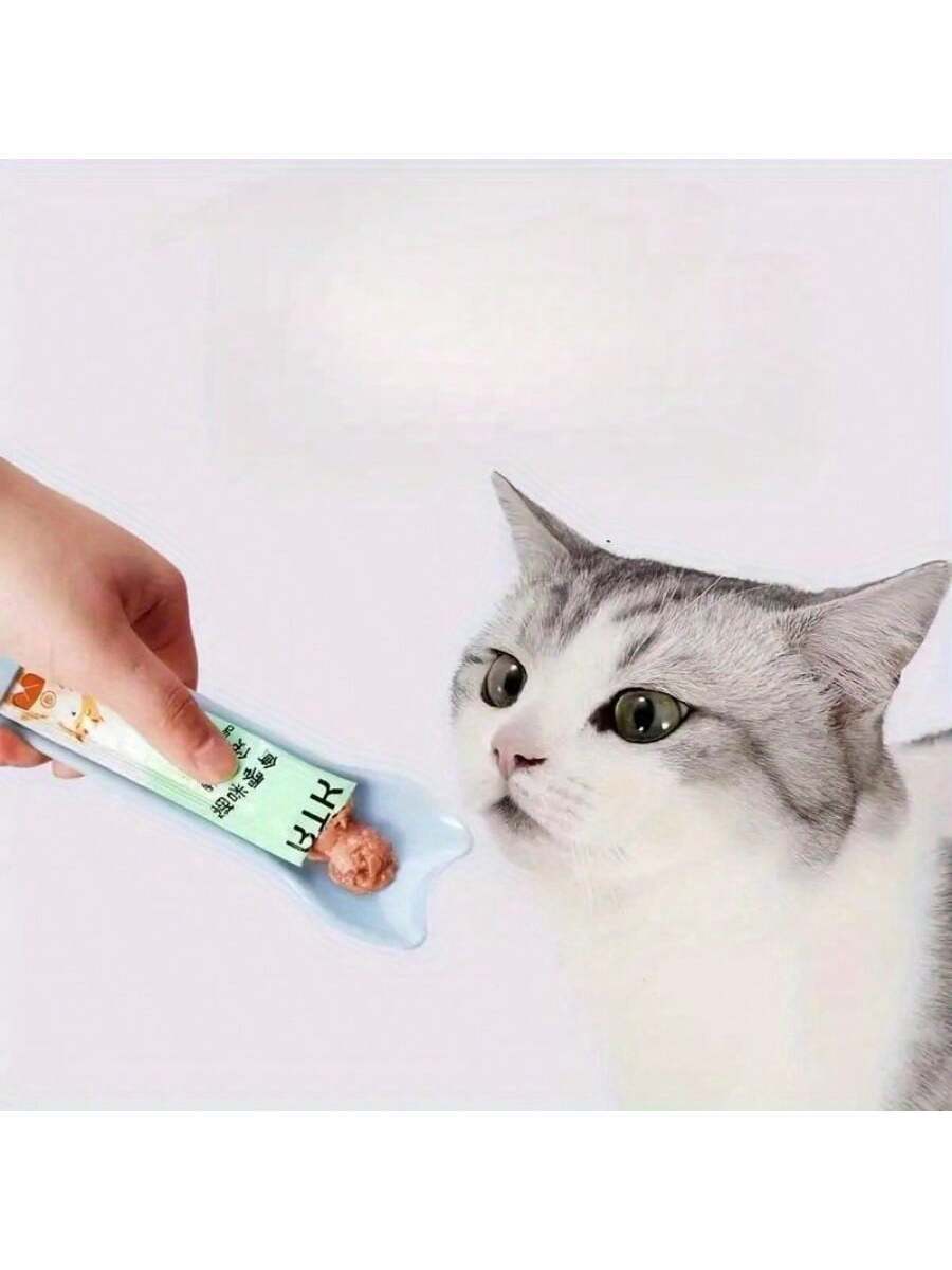 Multicolor cartoon PP cat strip squeeze spoon feeding tool for licking liquid cat treats.