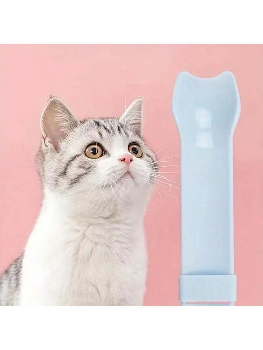 Multicolor cartoon PP cat strip squeeze spoon feeding tool for licking liquid cat treats.