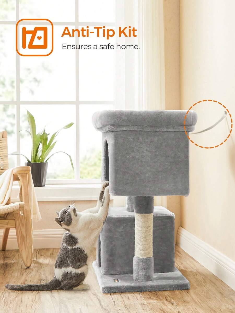 Light gray multi-level cat tree featuring two cat caves, sisal scratching posts, and a top perch for kittens and indoor cats.
