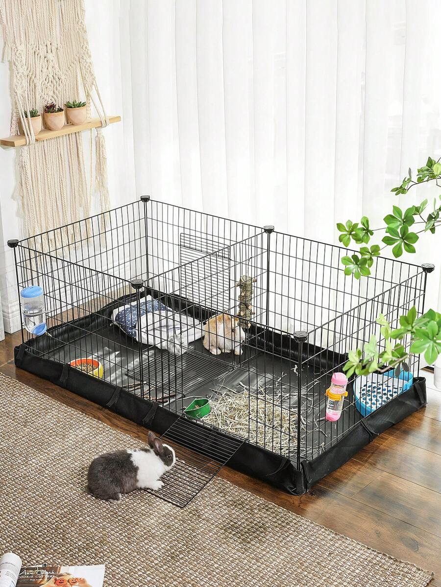 Black metal grid small animal playpen with a waterproof fabric liner and two separate space compartments for guinea pigs and rabbits.