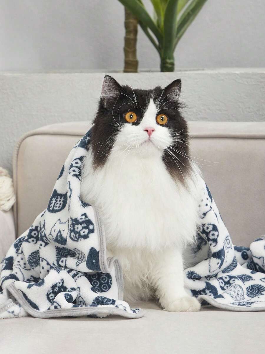 Warm plush pet blanket featuring a multicolor cartoon cat and plant print pattern, made from 100% polyester fabric for cats and dogs.