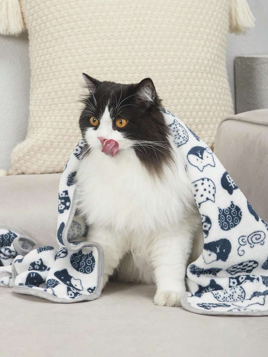 Warm plush pet blanket featuring a multicolor cartoon cat and plant print pattern, made from 100% polyester fabric for cats and dogs.