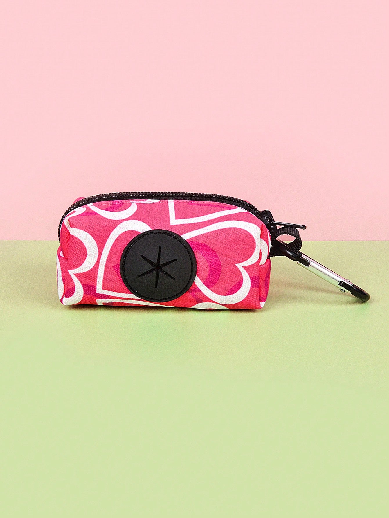 Hot pink heart print adjustable dog harness and leash set with matching poop bag holder for outdoor walking