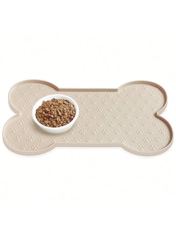 Multicolor bone-shaped silicone pet feeding mat with high spill-proof edge for cat and dog food and water bowls.