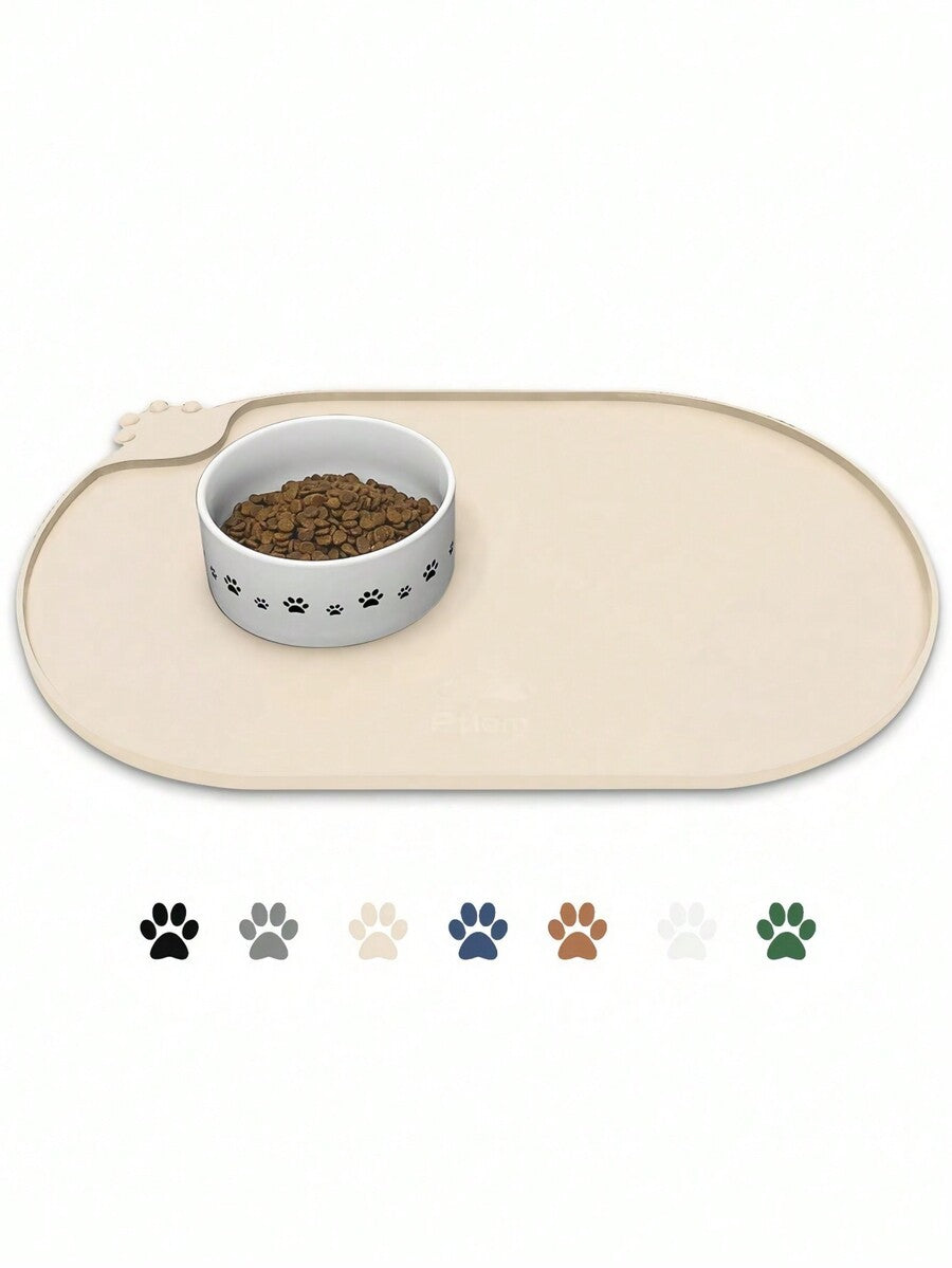 Black and white cartoon diatomite pet feeding mat placed under dog and cat food and water bowls to catch spills.