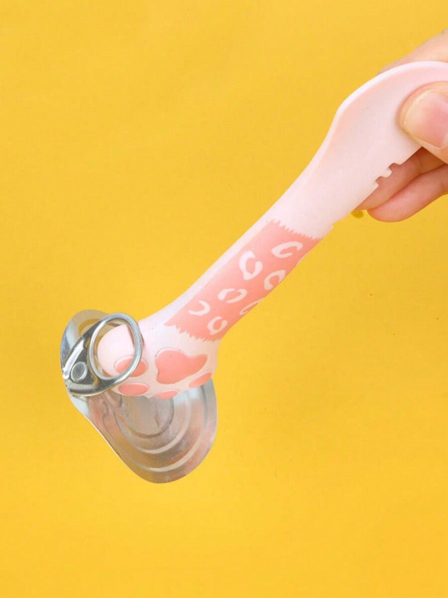 Multicolor cat paw shaped silicone pet can spoon and opener tool for feeding cats, dogs, and small animals.