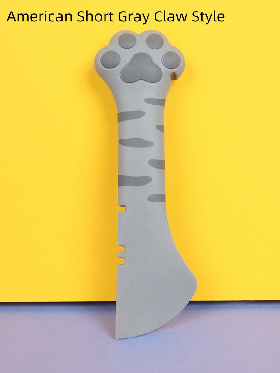 Multicolor cat paw shaped silicone pet can spoon and opener tool for feeding cats, dogs, and small animals.