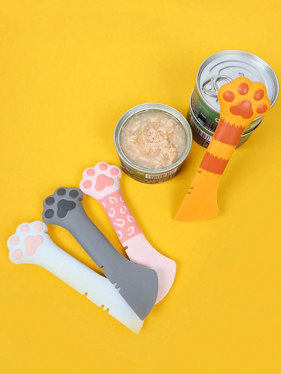 Multicolor cat paw shaped silicone pet can spoon and opener tool for feeding cats, dogs, and small animals.