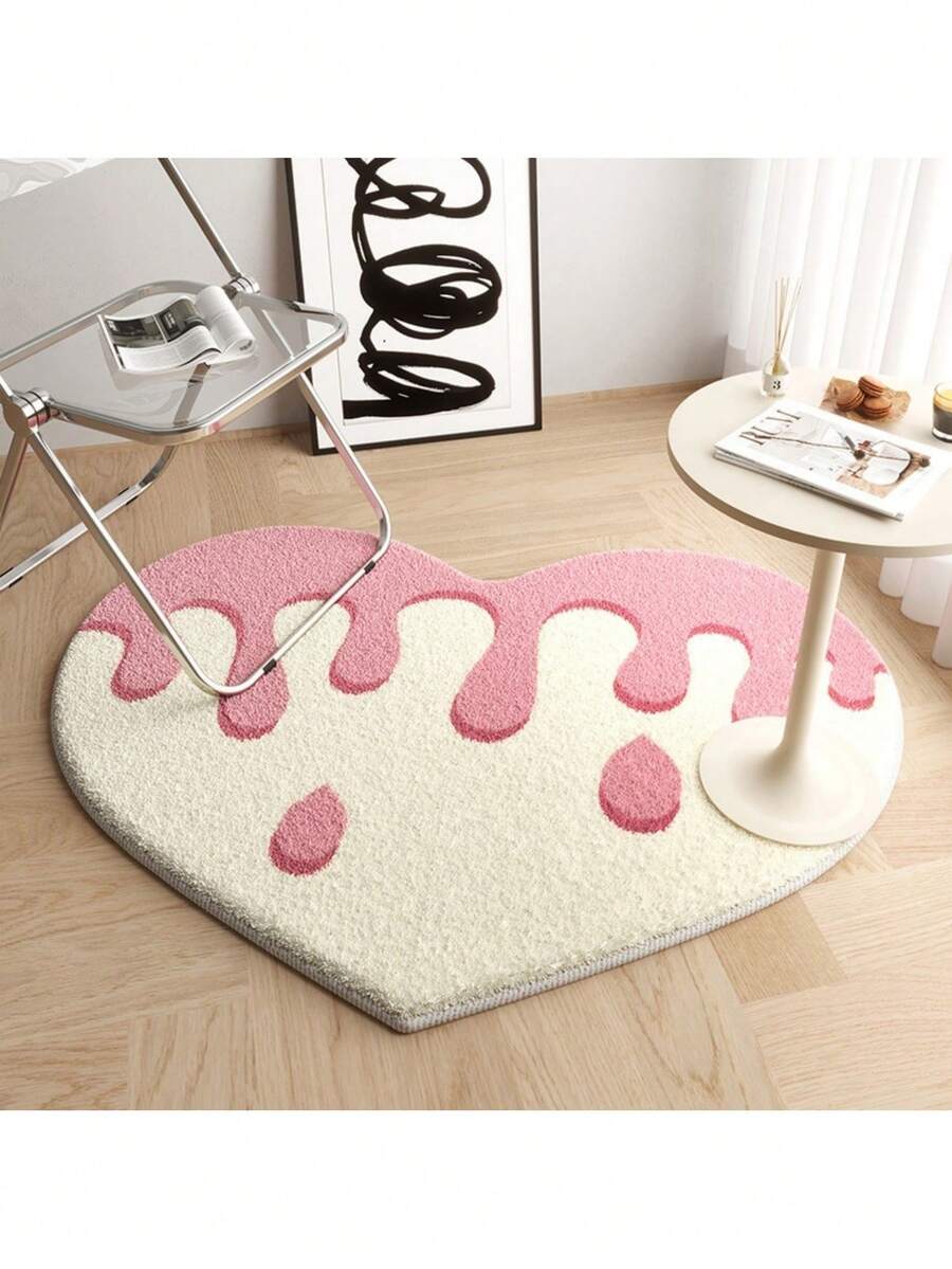 Heart-shaped pet cushion mat for cats and dogs made of soft plush polyester.