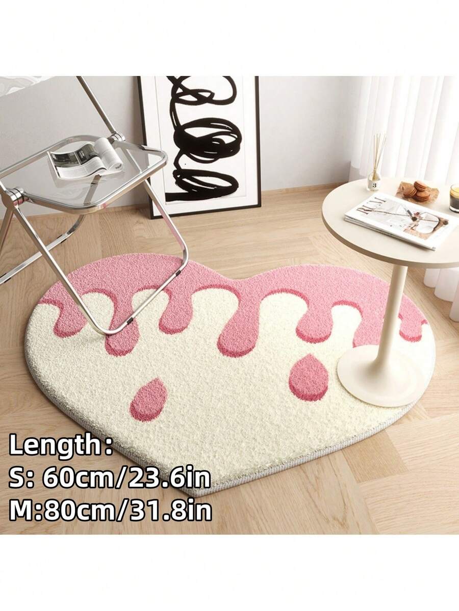 Heart-shaped pet cushion mat for cats and dogs made of soft plush polyester.