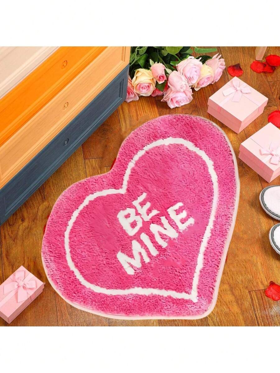Hot pink heart-shaped plush pet mat cushion with non-slip bottom for cats and dogs