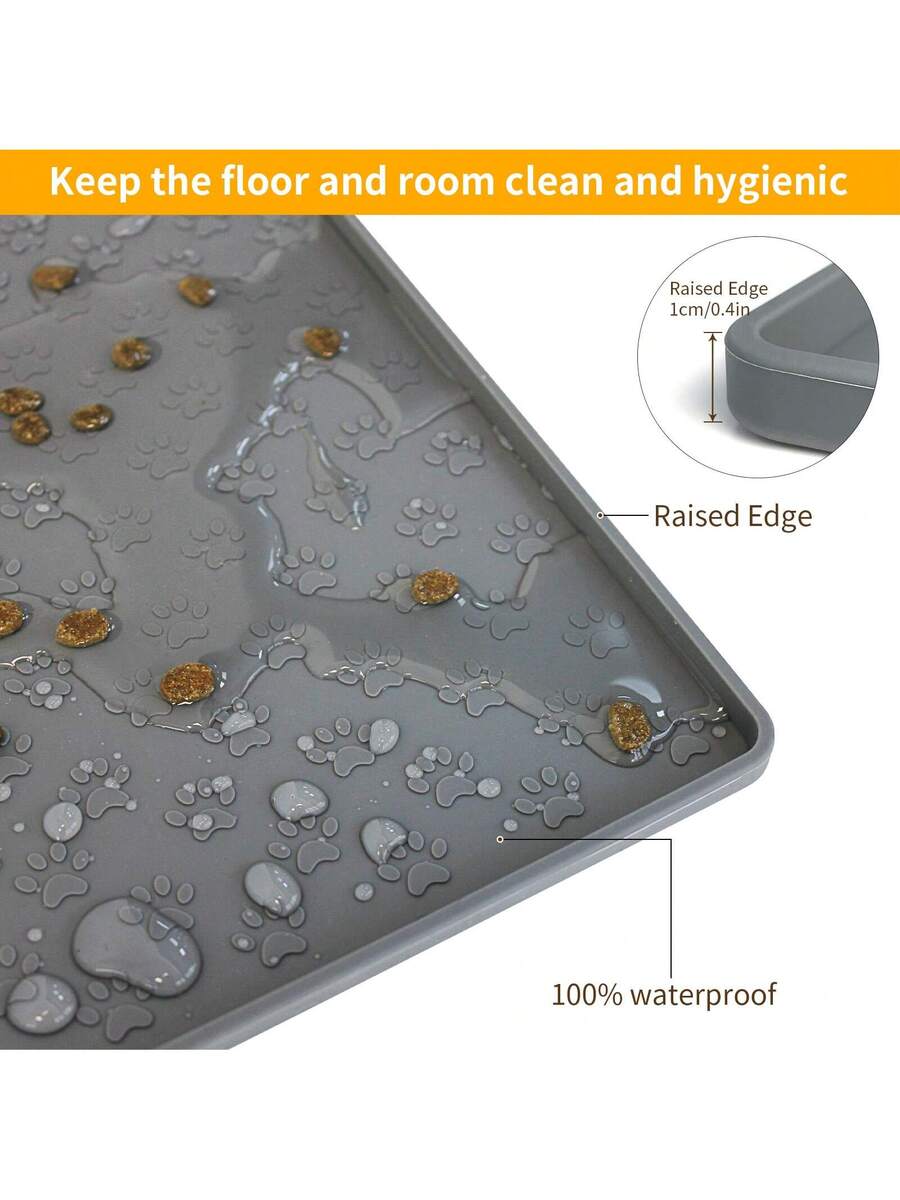 Beige silicone pet placemat with embossed paw print accents designed to catch food and water spills for dogs and cats.