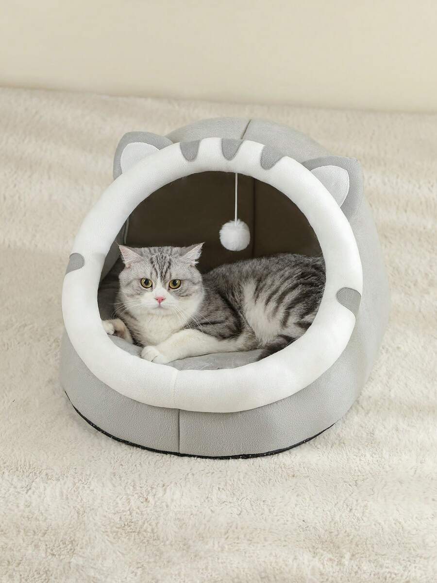 Grey soft cat bed house featuring a cartoon design made from breathable polyester material for pet sleeping