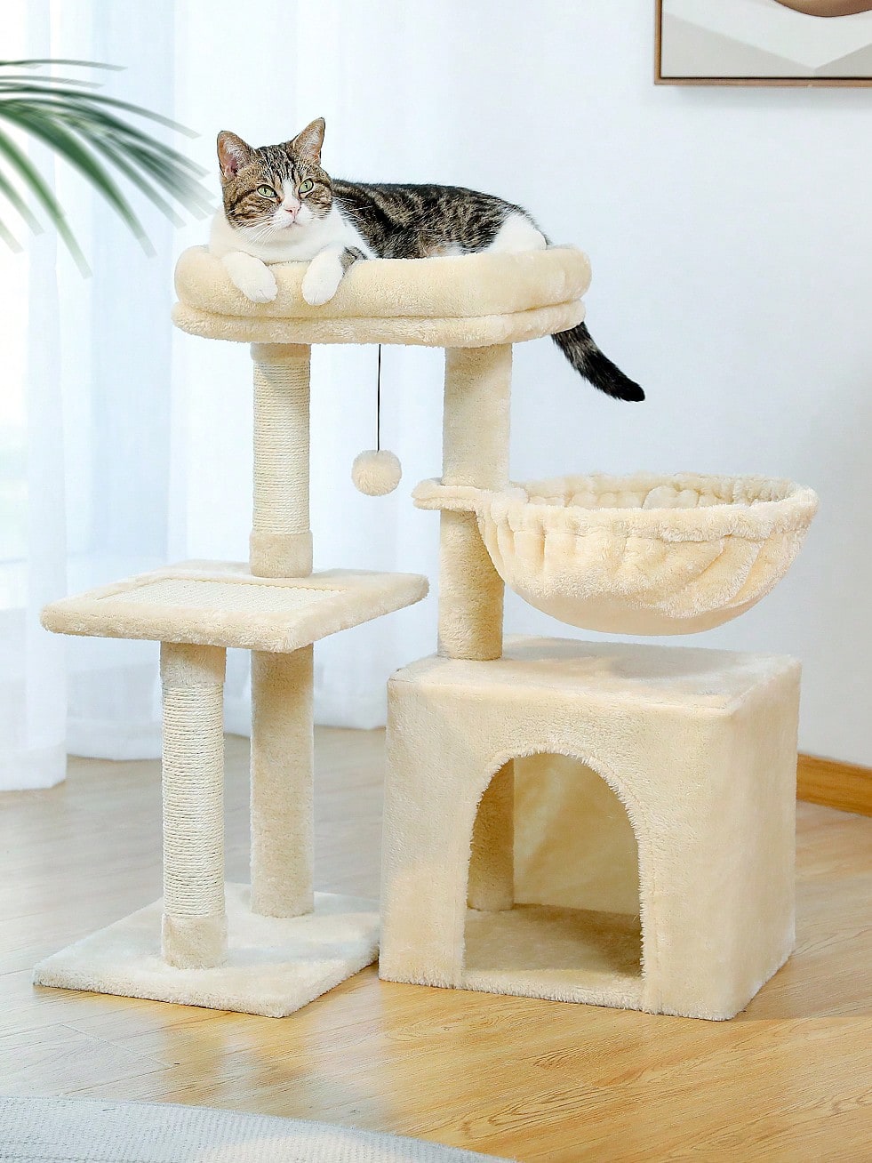 Beige 28.5-inch small cat tree for indoor cats featuring a removable top perch, deep hammock, cozy condo, and natural sisal scratching posts.