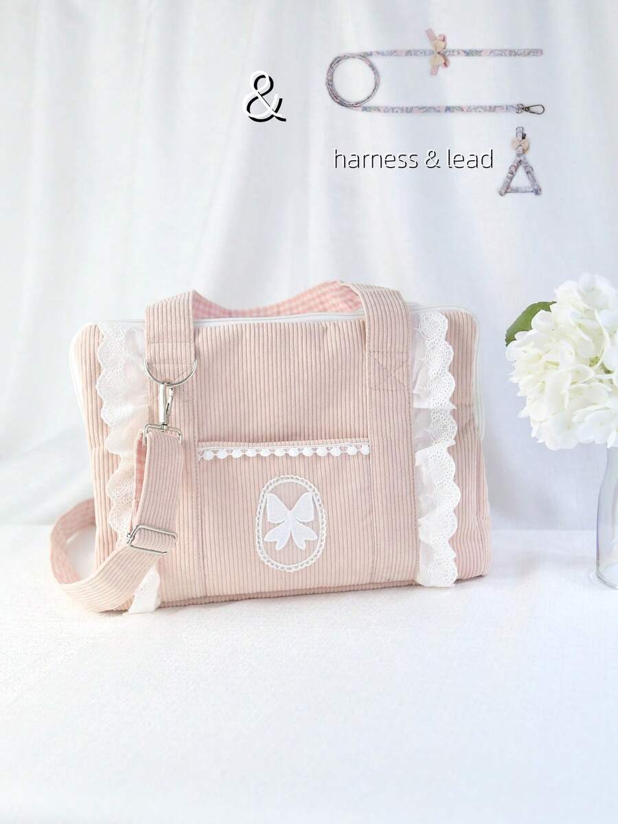 Pink polyester pet carrier bag with shoulder strap for small dogs and cats