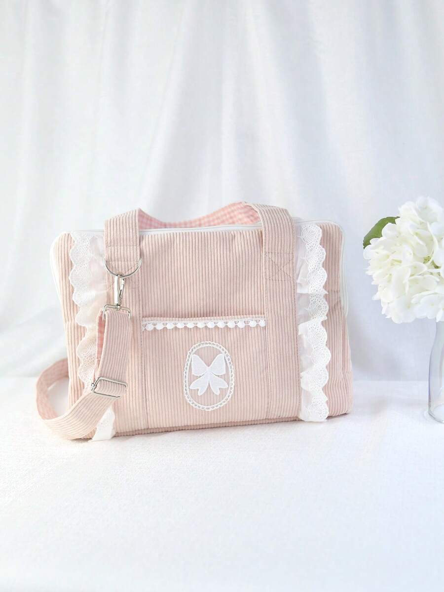Pink polyester pet carrier bag with shoulder strap for small dogs and cats
