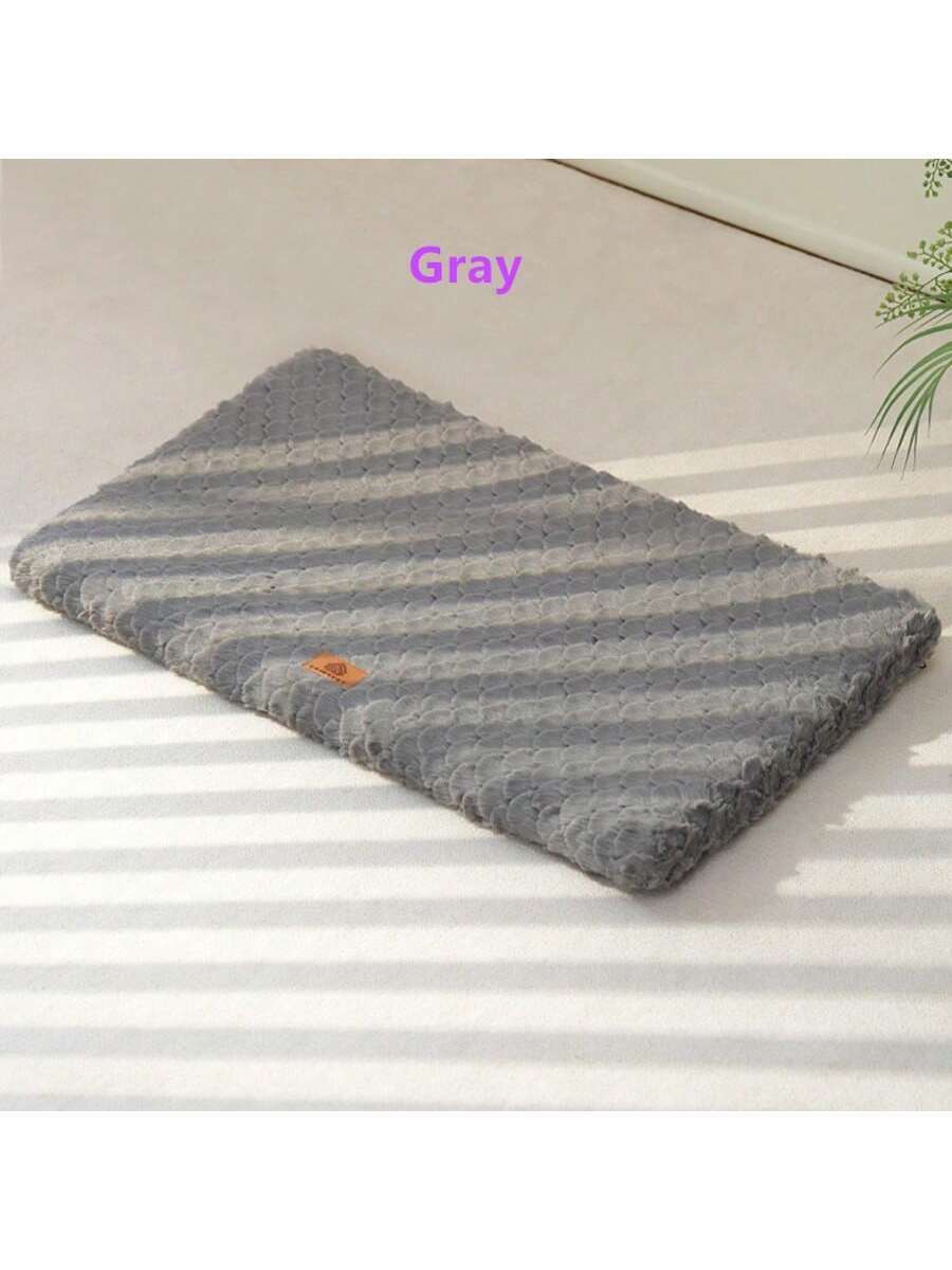 Grey washable dog bed mat with plush embossed fabric surface, egg-shaped polyurethane foam filling, and non-slip moisture-proof Oxford cloth bottom for dogs and cats.