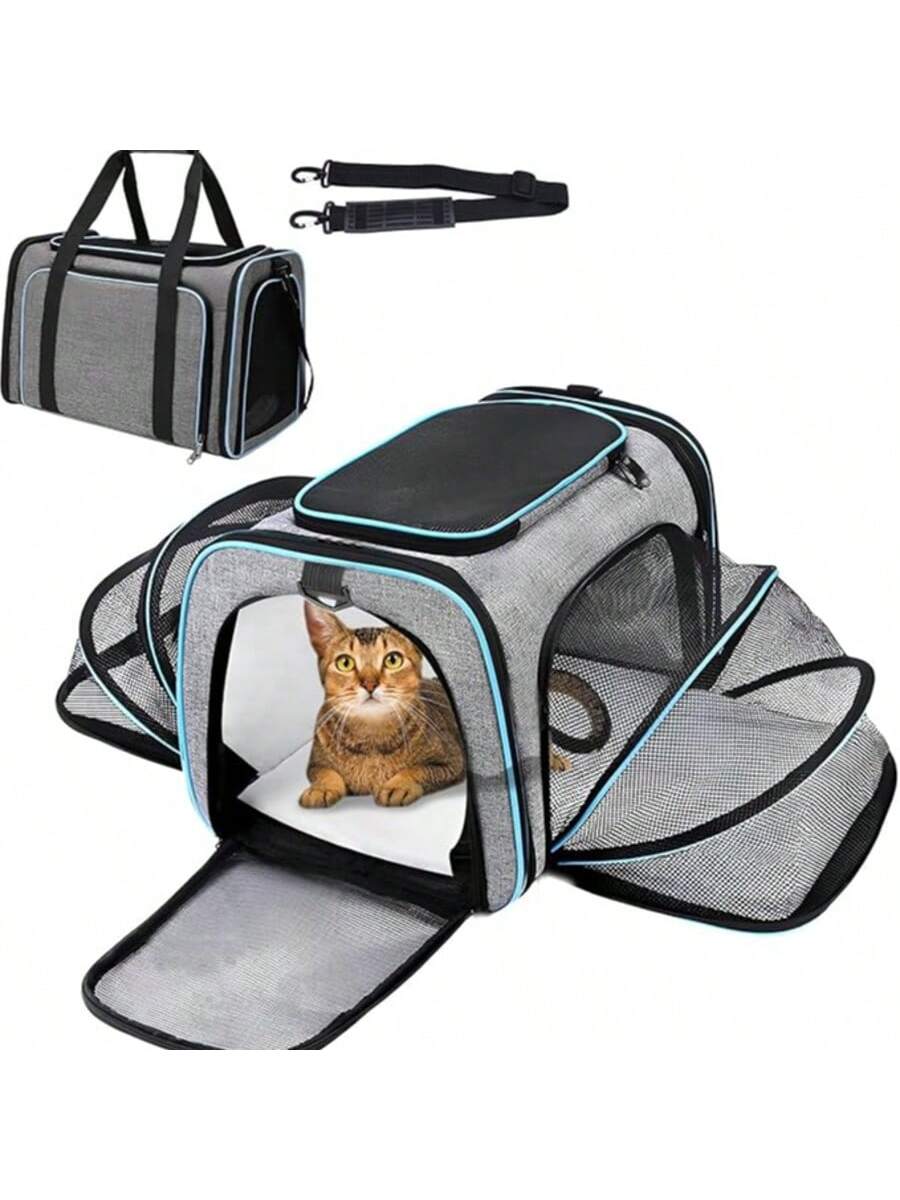 Blue expandable soft-sided pet carrier for cats and dogs featuring mesh ventilation windows, shoulder strap, and storage pockets.
