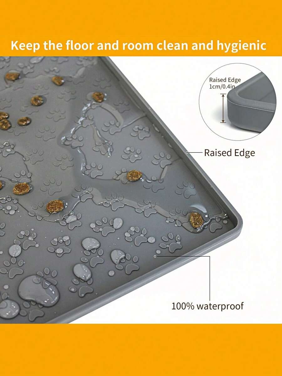Black and white cartoon diatomite pet feeding mat placed under dog and cat food and water bowls to catch spills.