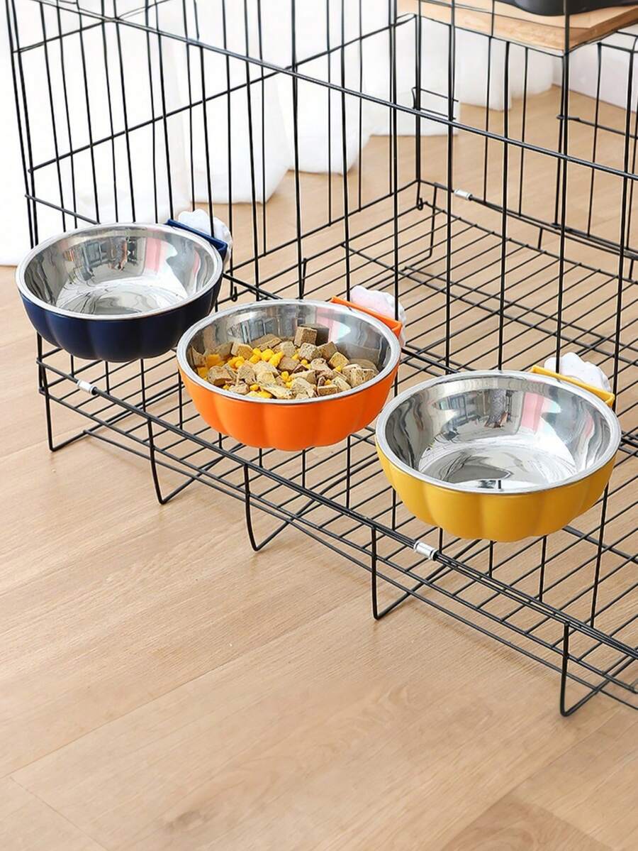 Orange pumpkin shaped raised pet bowl with a detachable stainless steel insert for small animals.