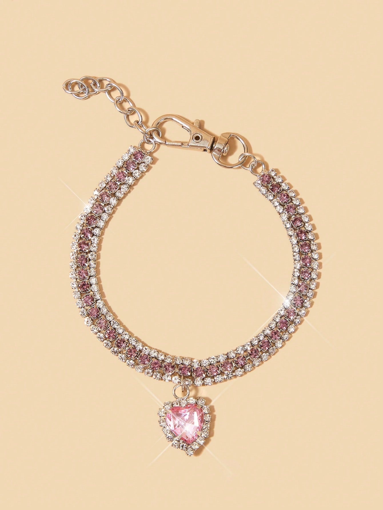 Pink sparkly crystal heart shaped adjustable breakaway collar for cats and small dogs, made from polyester for party dress-up or decorative pet styling.