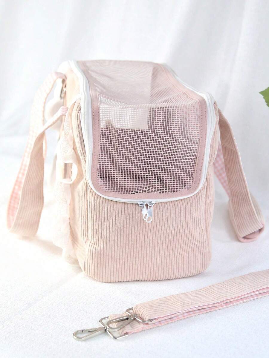 Pink polyester pet carrier bag for small dogs and cats on outdoor outings