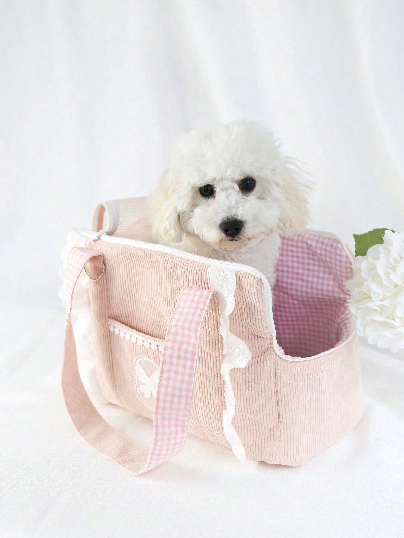 Pink polyester pet carrier bag for small dogs and cats on outdoor outings