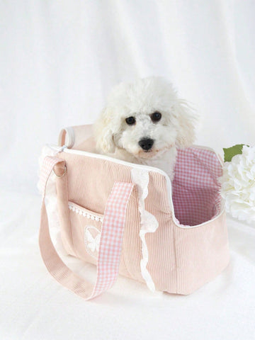 Pink polyester pet carrier bag for small dogs and cats on outdoor outings