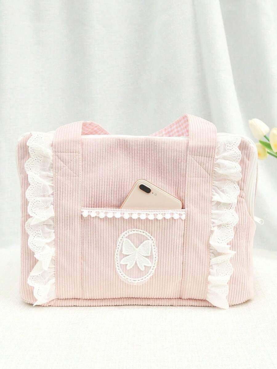 Pink polyester pet carrier bag for small dogs and cats on outdoor outings