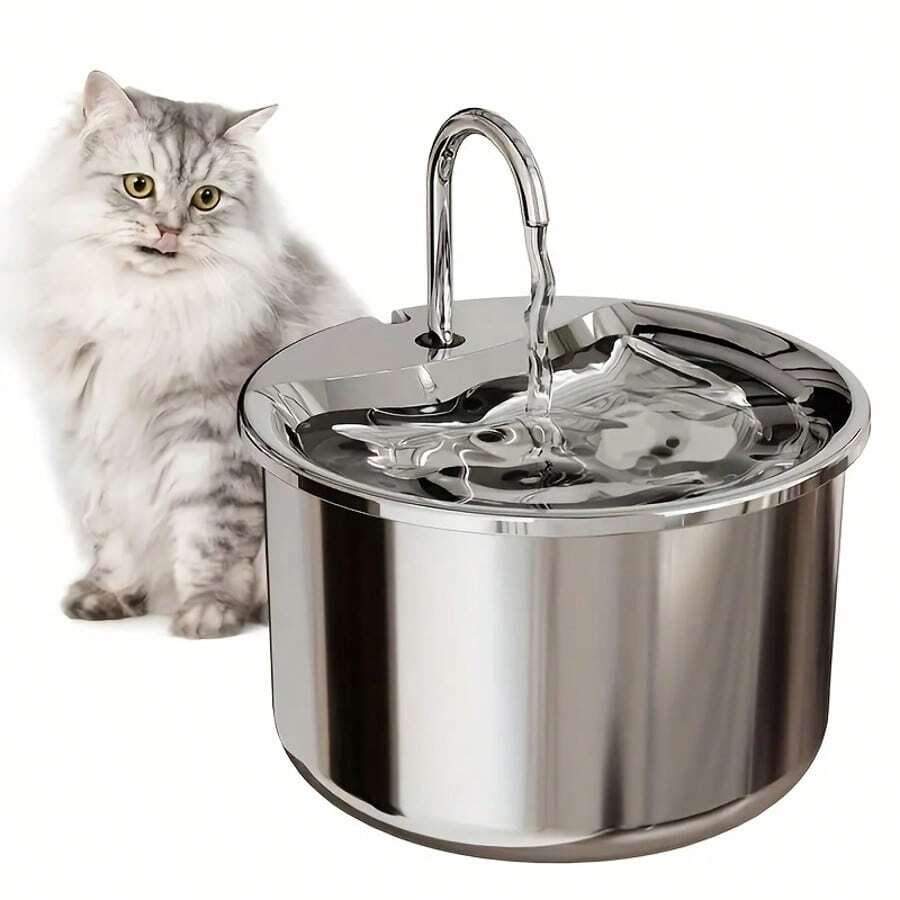 Stainless steel automatic pet water dispenser with USB power cord and splash-proof tray for indoor cats and dogs.