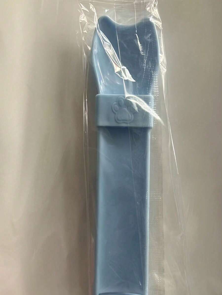 Multicolor cat squeeze tube feeder tool designed for dispensing liquid snacks and licking wet treats to cats.