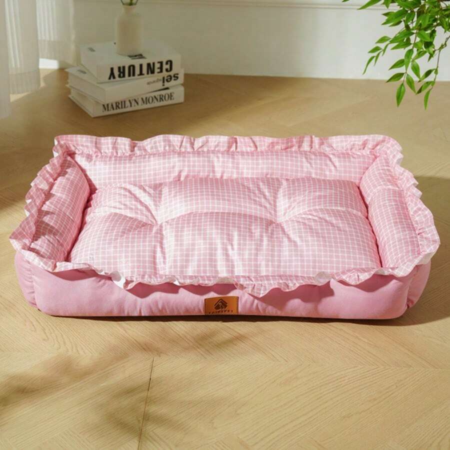 Multicolor plaid pet bed for small dogs and cats featuring a soft rolled edge design and polyester filling.